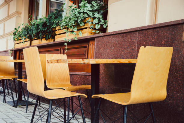 istock Empty chairs in outdoor cafe or restaurant 831700218