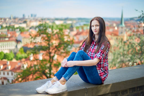 istock Young girl travelling in Prague alone 831704250