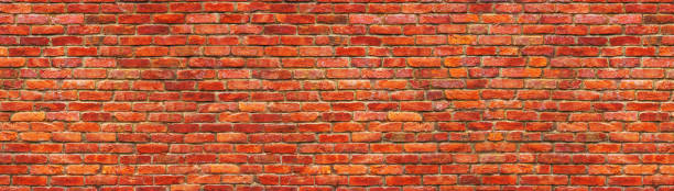 istock panorama brick wall, a broad band of the surface of masonry 831707744