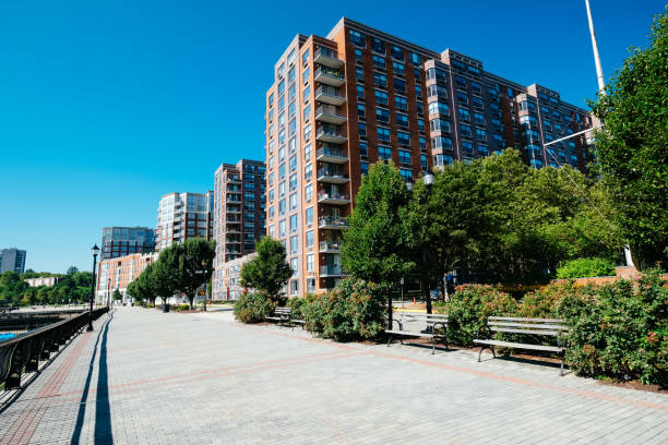 Waterfront on Sinatra Drive North at Hoboken, New jersey, on a sunny summer's morning. Hoboken has been redeveloped to attract professional groups and the ferry is a convenient link for these commuters.