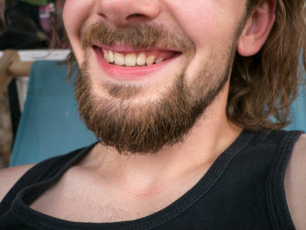 istock Close-up of a man beard, mustache and smile. 831711758