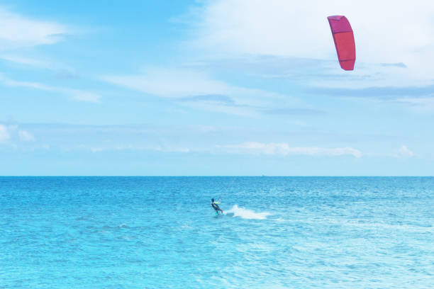 istock Background with sea, clouds,sand and Kite surfing 831712282