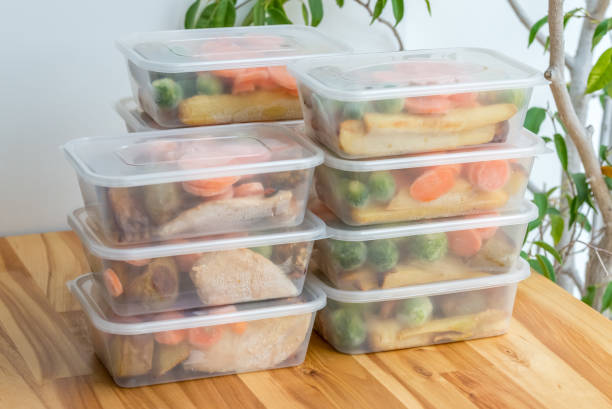 Meal prep. Stack of home made roast dinners Meal prep. Stack of home cooked roast chicken dinners in containers ready to be frozen for later use. box container stock pictures, royalty-free photos & images