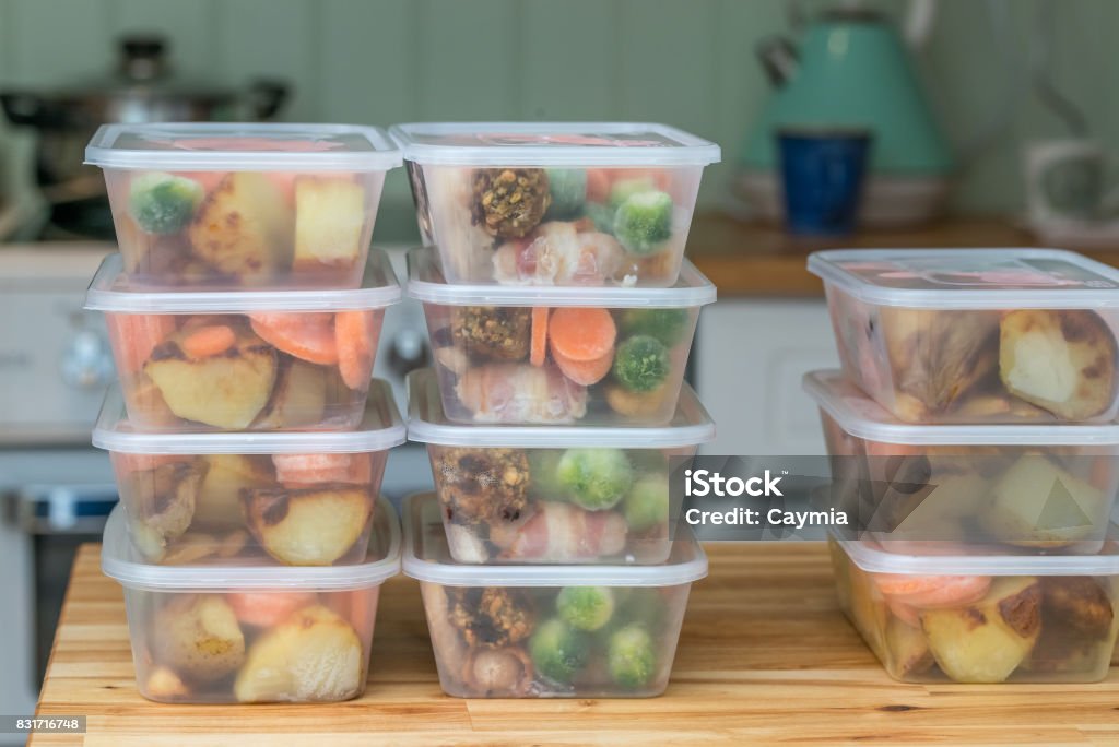 Meal prep. Stack of home cooked roast dinners Meal prep. Stack of home cooked roast chicken dinners in containers ready to be frozen for later use as quick and easy ready meals. Preparing Food Stock Photo