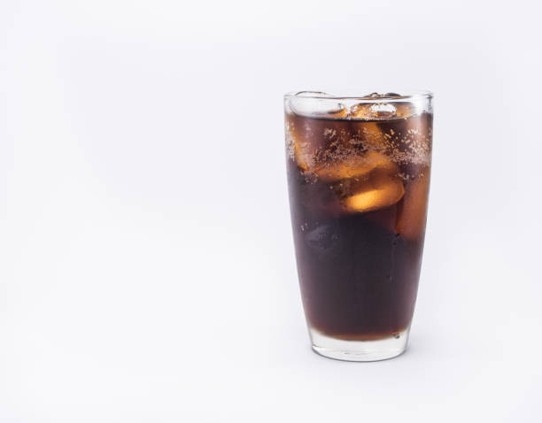 istock soft drink is cool with ice cubes in full glass on white background 831724558