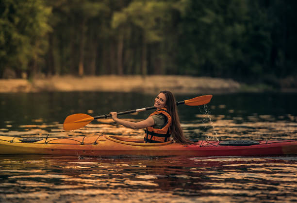 istock Woman and kayak 831727546