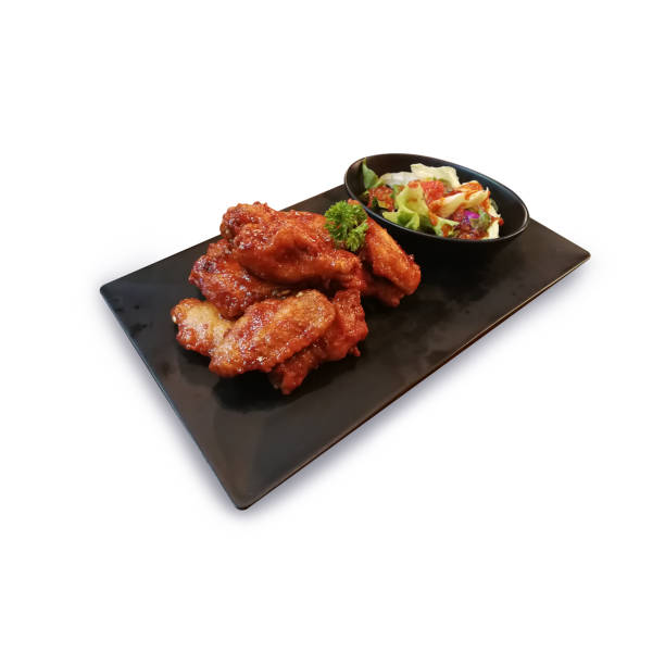 istock Fried chicken wings with sweet chili sauce isolate on white background 831728784