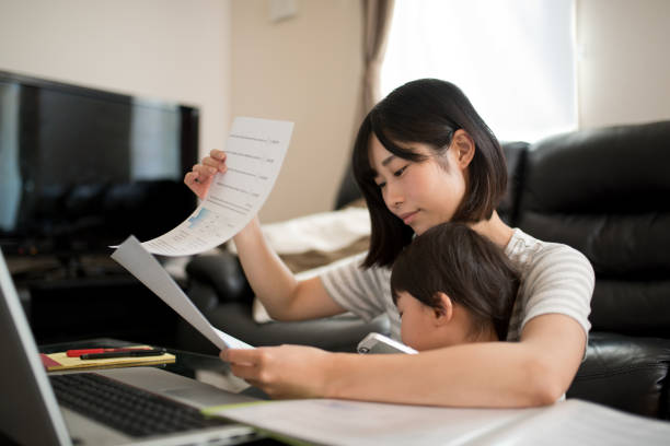 istock young mother working in house with her child 831730020