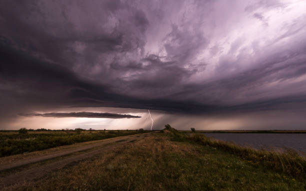 istock Rain and Lightning above the Fishpond 831732892