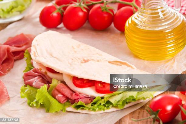 Piadina With Ham And Lettuce Stock Photo - Download Image Now - Appetizer, Baking, Bottle