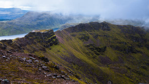 istock Majestic mountain ridge on overcast day in Scottish Highlands 831740688