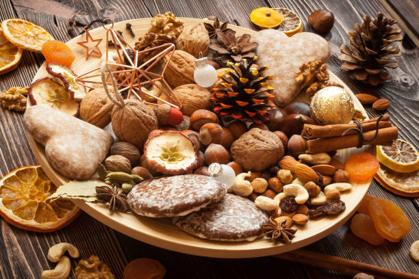 istock Snacks and decorations for Christmas on a bamboo plate. 831740920