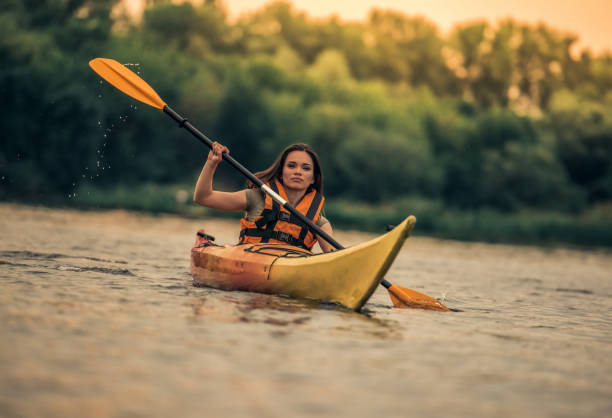 istock Woman and kayak 831741654