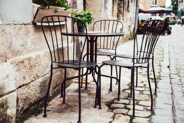 istock Empty chairs in outdoor cafe or restaurant 831745716