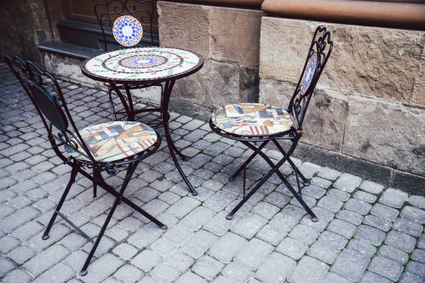 istock Empty chairs in outdoor cafe or restaurant 831747912