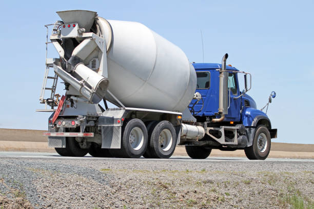 istock Cement Truck On Highway Delivering Concrete To A Construction Site 831756758