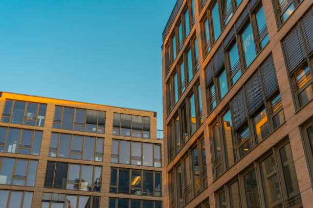 istock Exterior view on apartments with tall windows 831759852