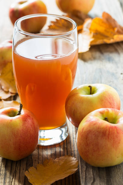 istock Apple cider ready to drink and ripe organic apples 831760048