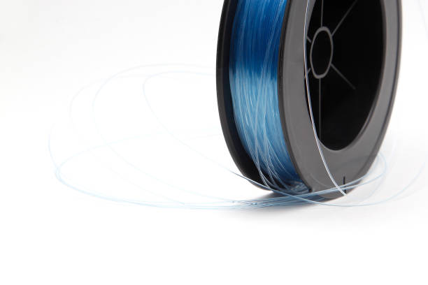 istock Blue fishing line on a white background 831763634