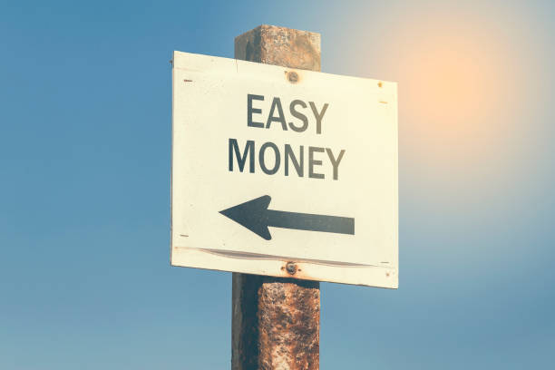 istock Easy money and arrow signpost 3 831765360