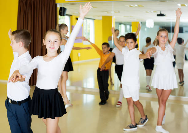 istock Boys and girls enjoying active dance 831777004