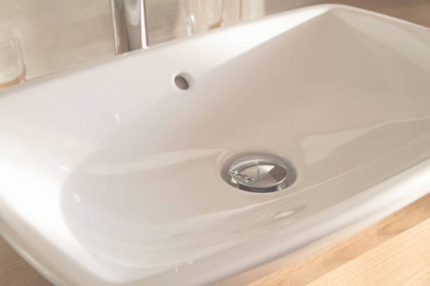 istock Soft focus close up white luxury washbasin, no tap 831777076