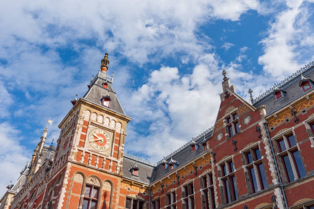 istock Fragment of cental train station in Amsterdam. 831791820