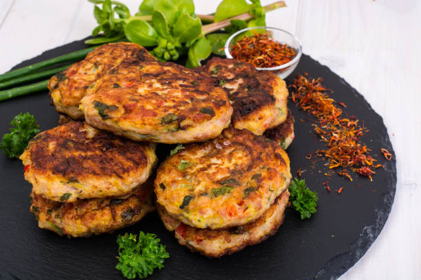 istock Meat dishes on black stone plate 831794796