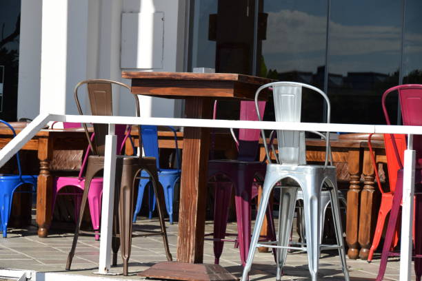 istock Multicolored plastic chairs in the restaurant 831796966