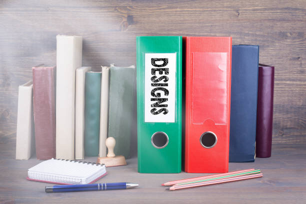 istock Designs. Binder on desk in the office. Business background 831797018