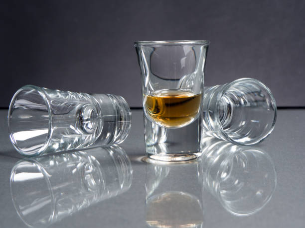 istock Whisky shot glass with reflections 831797112