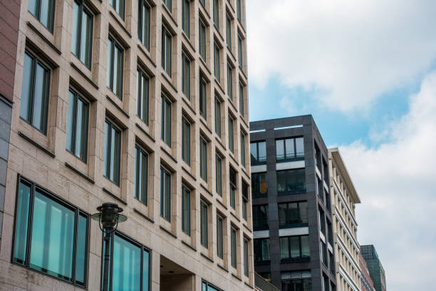 istock beautiful and modern architectured office houses in a row 831797460