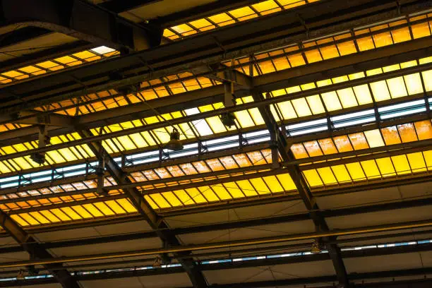 roof of an trainstation at berlin in yellow colors