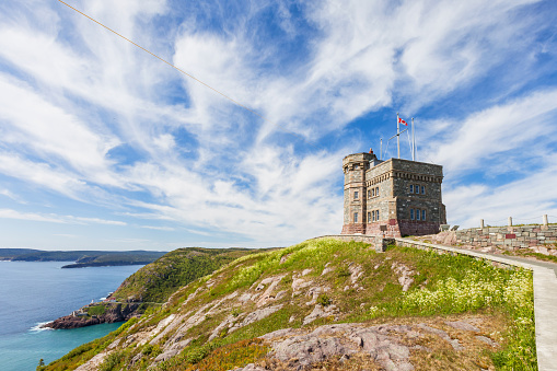 Stock photograph of Signal Hill with Cabot Tower in St John's, Newfoundland, Canada. Signal Hill and Cabot Tower are part of the Signal Hill National Historic Site of Canada.