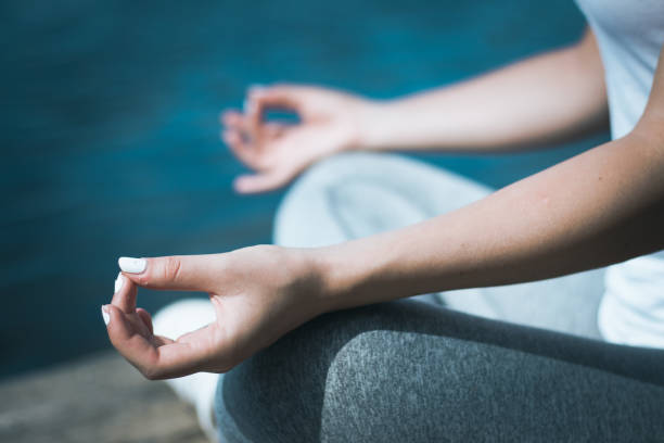 istock Meditation by the lake 831801458