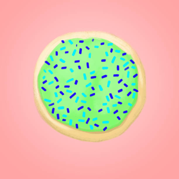 Sugar Cookie A sugar cookie with green icing and blue sprinkles. round sugar cookie stock illustrations