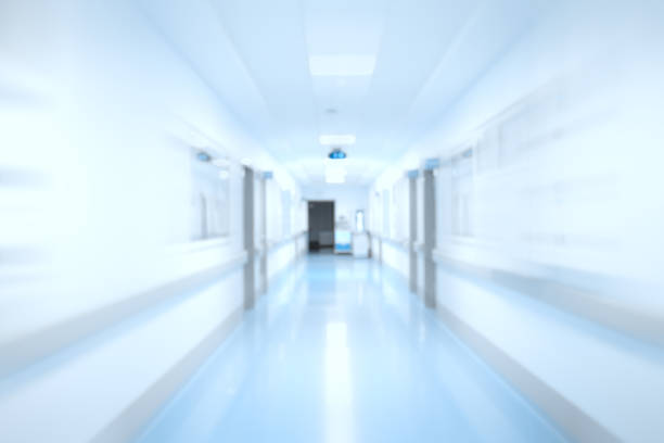 Long corridor of hospital building, defocused background.