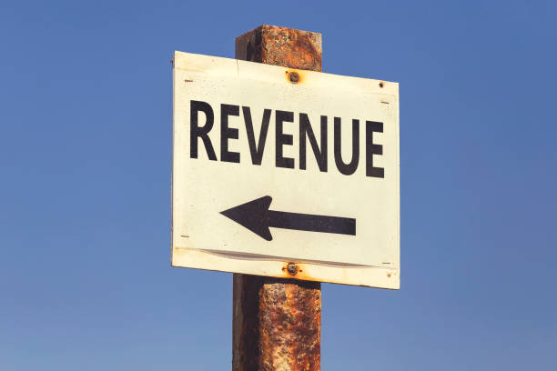istock Revenue word and arrow signpos 2 831808774