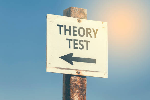 istock Theory test word and arrow signpost 3 831809064