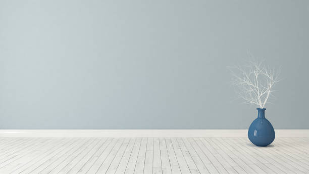 istock blue wall background with blue plant pot 831811440