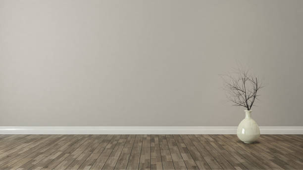 istock brown wall background with dry plant 831811638