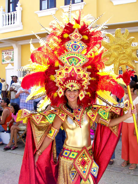 Carnival in the Caribbean Kralendijk, Bonaire - February 18, 2006: Traditional carnival on the Caribbean island Bonaire, one of the typical carnivals of the Caribbean region. A woman wears a costume typical of the party. showtime stock pictures, royalty-free photos & images