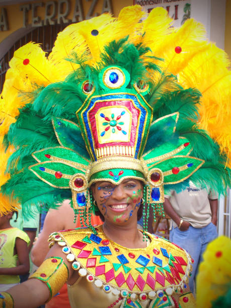 Carnival in the Caribbean Kralendijk, Bonaire - February 18, 2006: Traditional carnival on the Caribbean island Bonaire, one of the typical carnivals of the Caribbean region. A woman wears a costume typical of the party. showtime stock pictures, royalty-free photos & images