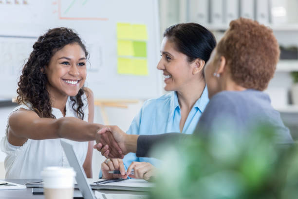 istock Young interviewee is offered job on the spot 831814952
