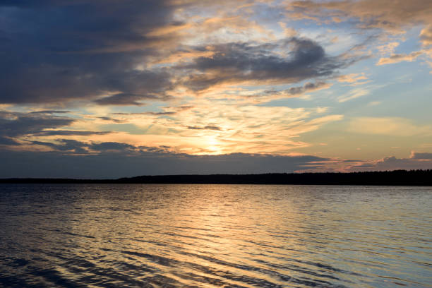 istock Picturesque summer sunset on the lake. 831815216