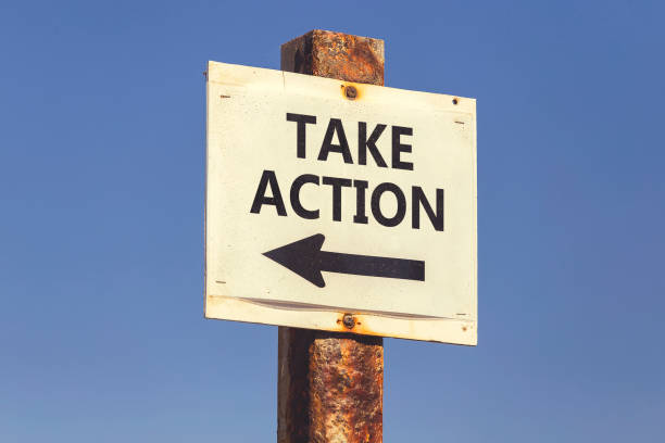 istock Take action word and arrow signpost 2 831817552