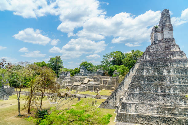 istock Panoramic view over Maya pyramids and temples in national park Tikal in Guatemala 831825086