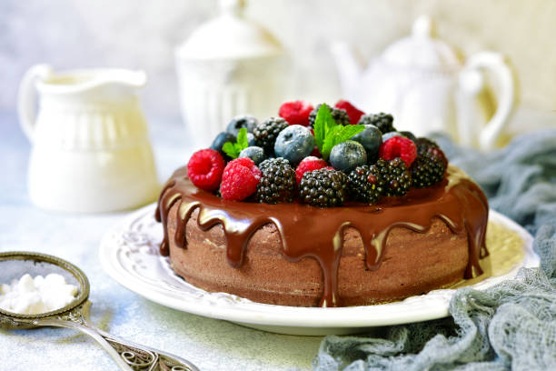 istock Homemade chocolate cake with fresh berries 831829524