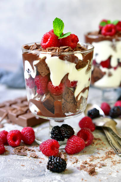istock No baked brownie cheesecake with fresh berries 831829564