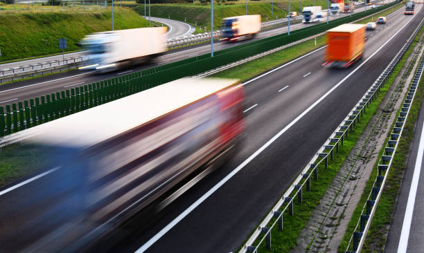 istock Trucks on four lane controlled-access highway in Poland 831829818
